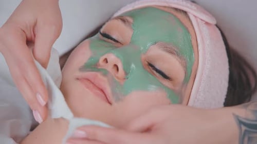 Cosmetologist Removes Clue Mask From Woman's Face Uses Wipes in Beauty Salon