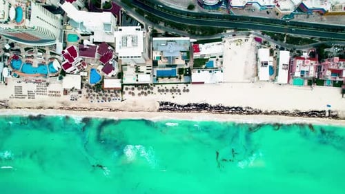 Top view of beautiful beach. Aerial drone shot of turquoise sea water at the beach.