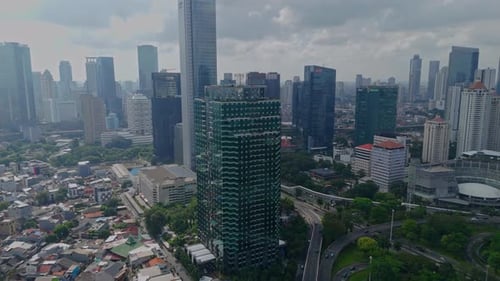 Jakarta, 01 July 2025, Aerial view Jakarta Cityscape with Semanggi Bridge and Skyscrapers