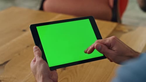 Man Finger Swiping Greenscreen Tablet Office