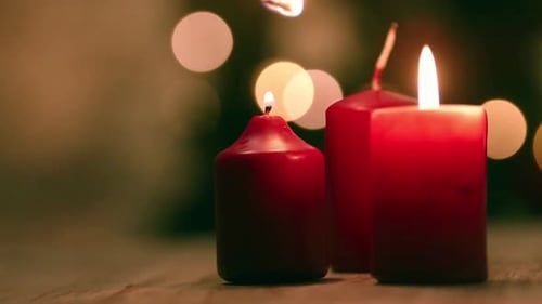 Festive Red Candles Lit With Warm Bokeh Lights