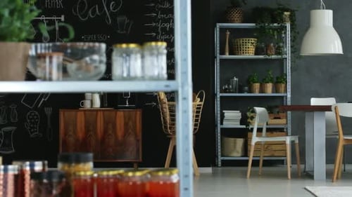 Stylish dining room interior with chalkboard wall art