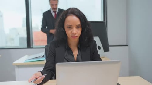 Latino young beautiful businesswoman working in the office workplace.