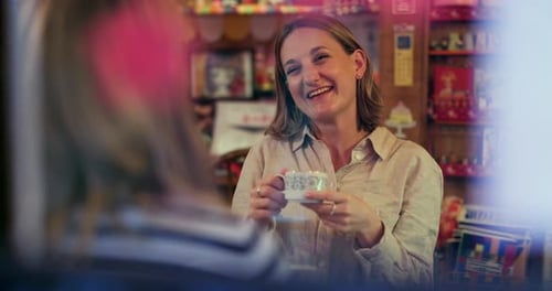 Friends, coffee shop and funny with women, smile and conversation with happiness