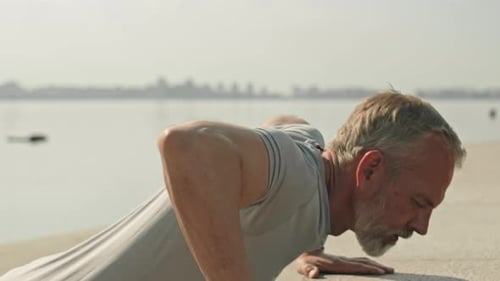 Man Doing Push-Ups Outdoors