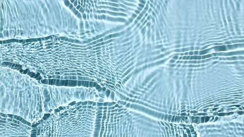 Pure Water with Reflections Sunlight in Slow Motion Water Surface Texture Top View Sun and Shadows