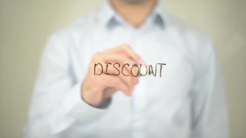 Man Writes the Word Discount on Screen