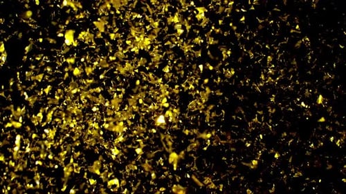 Falling Golden Confetti Against a Black Background