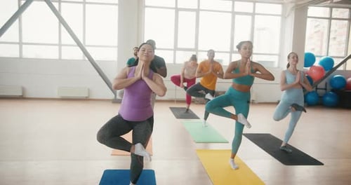 People Try to Do Tadasana During Beginner Yoga Session
