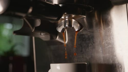 4K Slow Motion Espresso Machine Drips into Small Cup