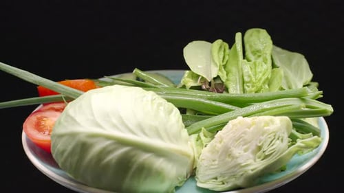Fresh Vegetables on a Plate in Close-Up