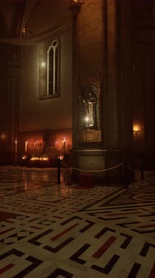 Dimly Lit Room With Central Statue