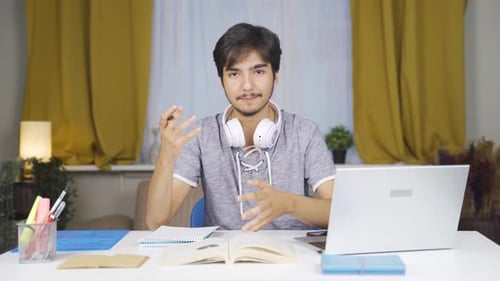 Enthusiastic Man Explaining Concepts at Home Office