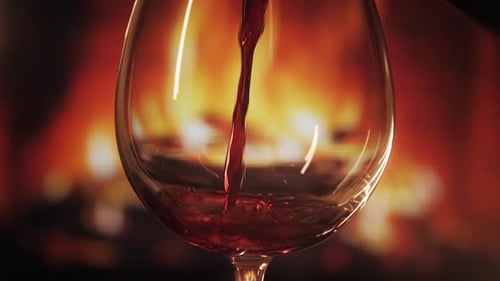 Young Red Wine Pouring Into Wine Glass Slow Motion Close Up Shot