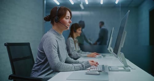 Women Working at Computers in Modern Office