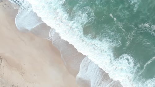 Aerial view of Tropical Beach and wave with white sand and blue sea