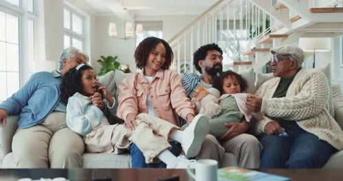 Family Relaxing Together on Couch at Home