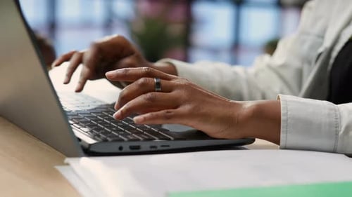 Freelancer in Home Office Typing on Laptop Keyboard Close Up
