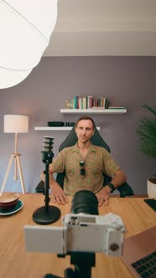 Podcaster Recording an Episode in a Professional Home Studio with Modern Equipment and Technology