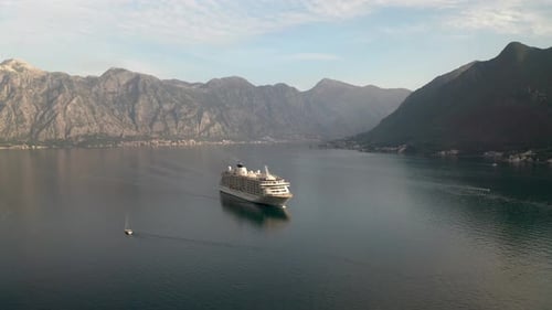 Large cruise ship passing through the picturesque bay of Kotor in Montenegro