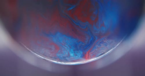 Abstract Swirl of Red and Blue Paint