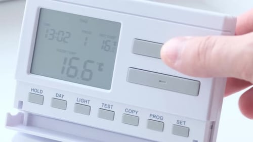 Setting Temperature on Digital Home Thermostat