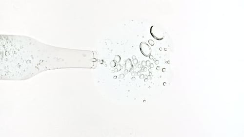 Clear Serum Dropper Dispensing Bubbling Liquid