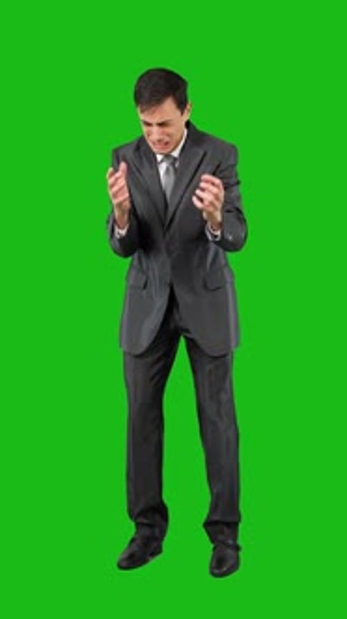 Businessman in Suit Crying in Studio Chroma Key