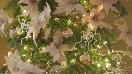 Christmas Tree Decorations with Lights and Floral Ornaments