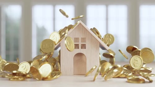 Gold Coins Falling Around Wooden House for Financial Concepts