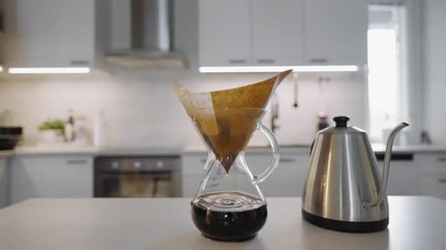Pour Over Coffee Brewing in Modern Kitchen