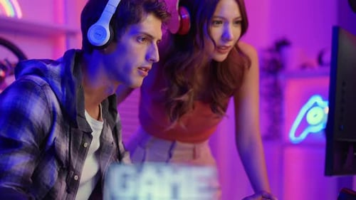 Young Adults Playing Computer Game Together