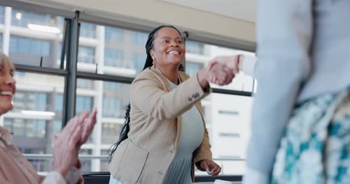Businesswoman Shakes Hands After a Successful Meeting