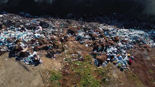 Aerial Panoramic View of Huge City Garbage Dump at Sunset