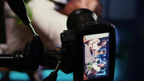 Digital Camera Displaying Podcast Recording on Screen