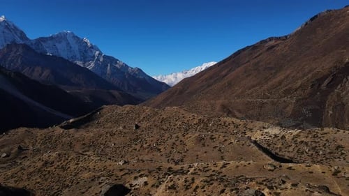 Mountain Landscape in Nepal with Towering Snowy Peaks