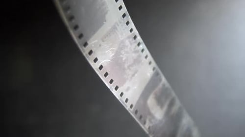 Close Up of Film Strip with Grain and Scratches