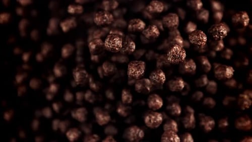 Chocolate Puffs Cereal Rising and Falling Background