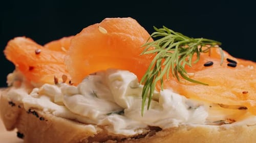 Bagel Sandwich Brunch Lunch Plate of a Bagel with Smoked Salmon and Cream Cheese and Ham Close Up