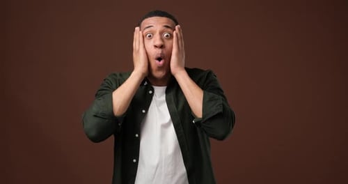 Man Reacting with Surprise and Excitement