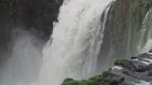 Close up of a big waterfall. View of the natural landmark. Slow-motion.