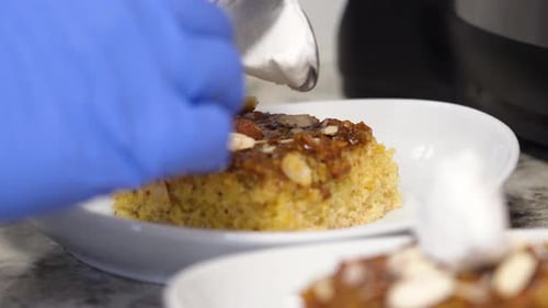 Adding Whipped Cream to Delicious Dessert on Plate