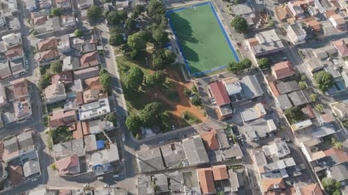 Aerial View of a Soccer Field and Urban Park Neighborhood