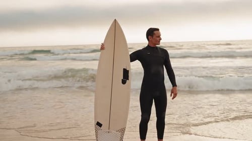 Surfer On The Beach