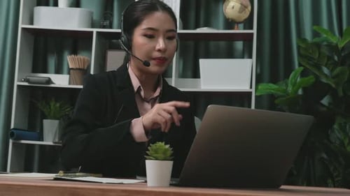 Woman in Suit Working at Computer in Home Office