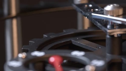 Clockwork Gears Turning in Extreme Close Up