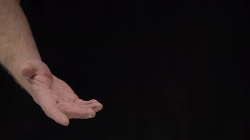 Hand Pointing Right on Black Background