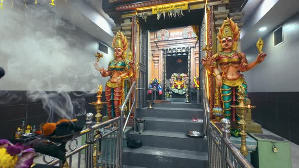 Serene Hindu Temple Interior with Sacred Rituals and Divine Statues ...