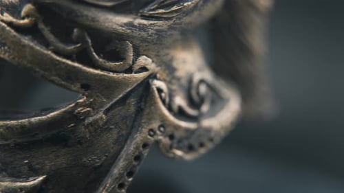 A close up detailed shot of a spartan face design, warrior ancient greek bronze helmet, on a 360 rot
