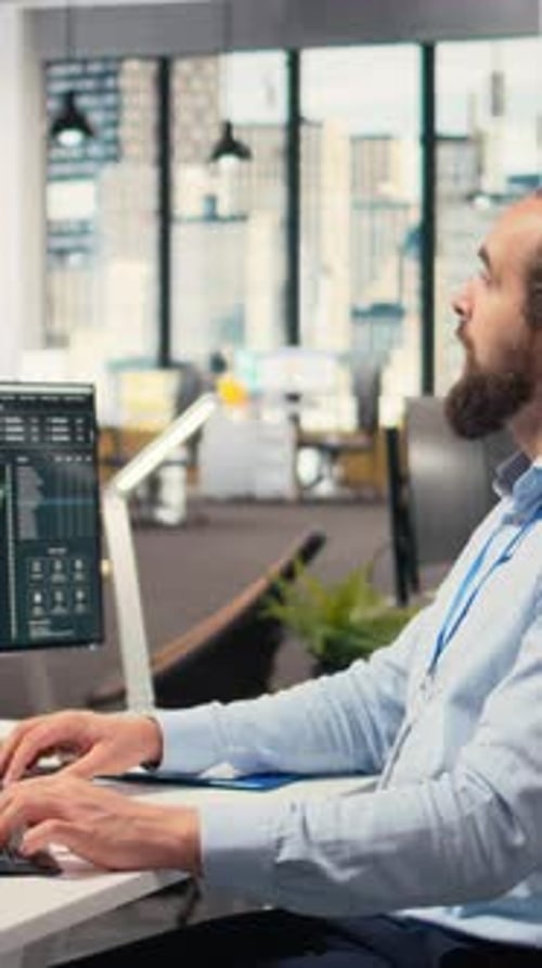 Vertical Video Day Trader in Office Leverages AI Analytics to Interpret Candlestick Charts